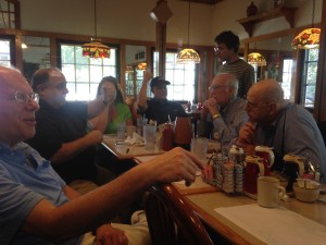 Members of the club gathering for breakfast at one of the local restaurants.